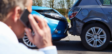 Driver Making Phone Call After Traffic Accident