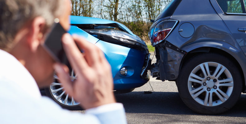 Driver Making Phone Call After Traffic Accident